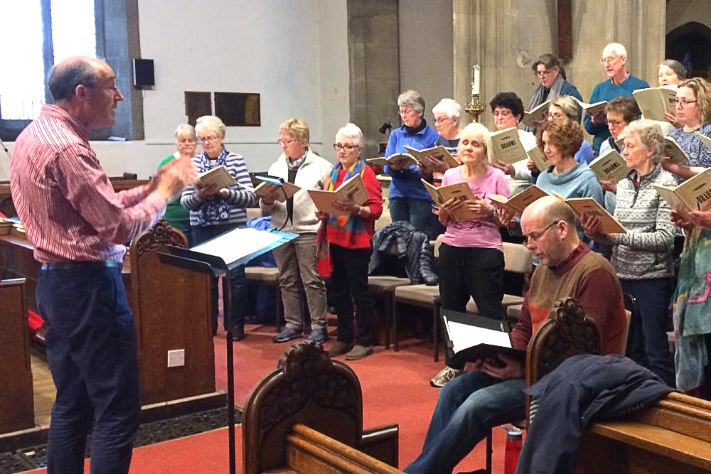 Choir practising in church before the concert.